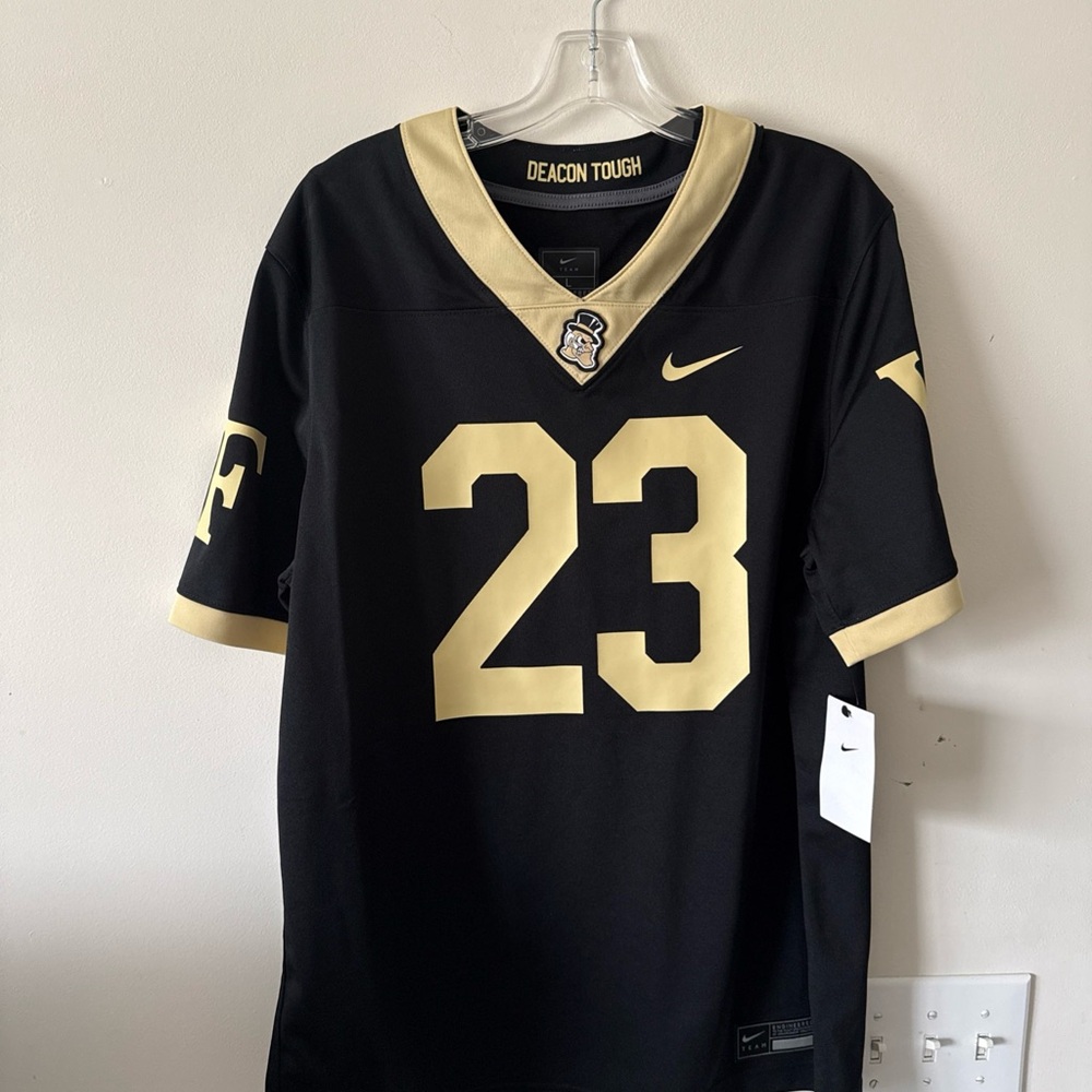 Nike Men's Black and Gold Jersey